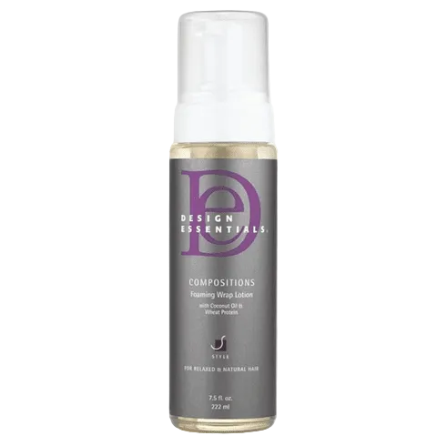 A bottle of Design Essentials Compositions Foaming Wrap Lotion with a white pump, infused with Coconut Oil and Wheat Protein.